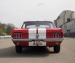 Oldtimer Ford Mustang Coupé in rot-weiß zum selbst fahren